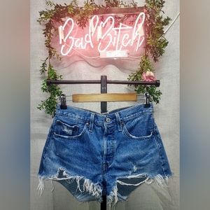 Levi 501 medium wash high waisted shorts